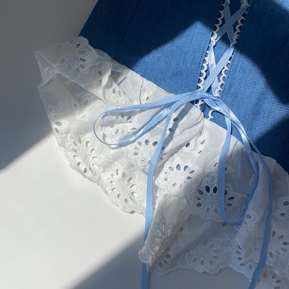 Blue shorts with lace bottom and adjustable ties - Picture 2 of 6
